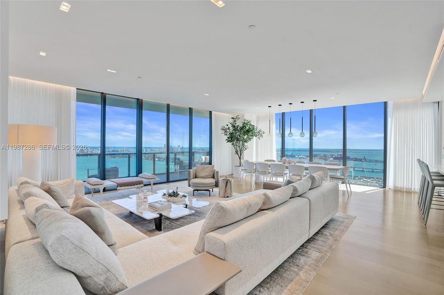 Breathtaking 180-degree views of the open bay, Downtown Miami skyline, and the Atlantic Ocean define this exceptional residence at Elysee Miami. A private elevator entry opens directly into 3,966 total square feet of updated living space, offering a refined expression of modern luxury.

This fully remodeled 5-bedroom, 5.5-bath home features bright, expansive interiors, soaring ceilings, and two oversized terraces capturing sunrise and sunset views. The residence is appointed with a full Savant smart home system controlling lighting, audio, climate, and shading, along with Waterworks fixtures and Sub-Zero and Wolf appliances throughout.

The fifth bedroom is currently configured as a den and can be easily converted back to a full bedroom.

Elysee Miami offers boutique living with only two residences per floor and fewer than 100 total homes. Amenities include sunrise and sunset pools, fitness center, spa, yoga studio, children’s playroom, and resident lounge. Full-service building with 24-hour concierge, security, and valet.

Ideally located in Edgewater, minutes from the Design District, Midtown, Wynwood, Downtown, and Miami Beach.