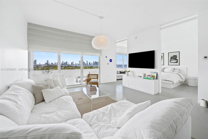 Presenting 3 Island Avenue PH-G on Belle Isle. "Architectural Digest" quality renovation with no detail overlooked. This top high floor unit offers 12.5 ft ceilings with  Million Dollar views of Biscayne Bay and the Miami skyline & the most spectacular sunsets from every room. Sleek Italian custom kitchen with high end appliances. Brand new impact doors and windows (complete wall of windows 4 panels not a partial 3 panel view). Private Balcony with amazing views. The building was designed by renowned architect Morris Lapidus. This mid-century gem is the perfect blend of luxury, style and timeless design.