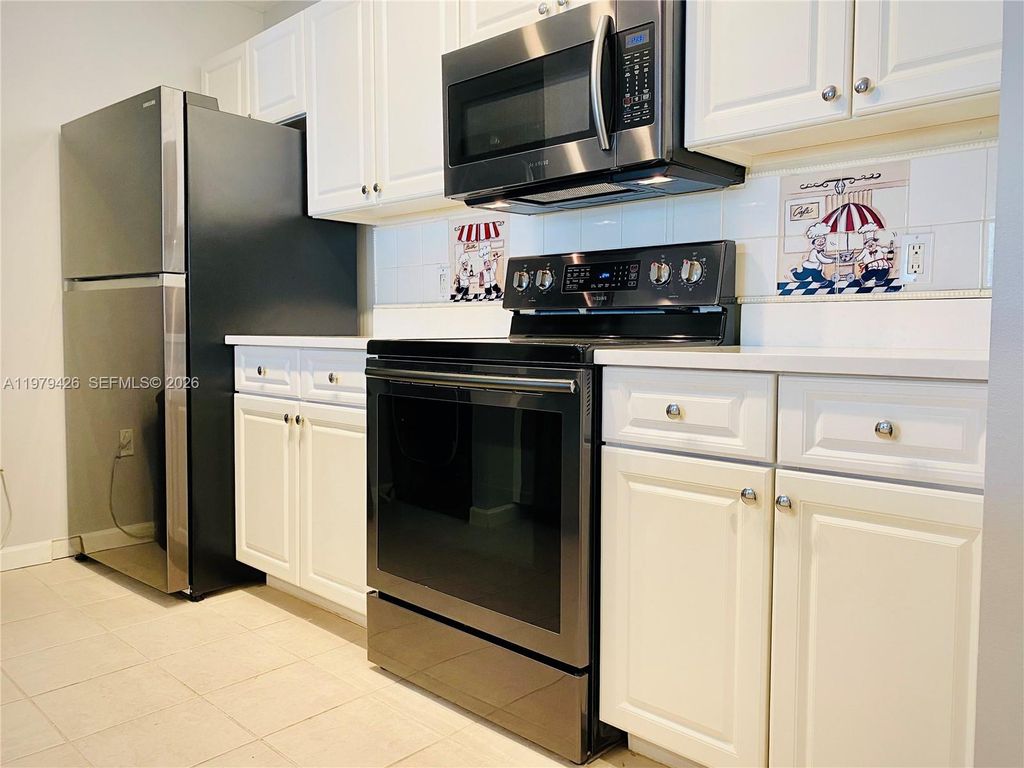 Photo of 1200 Town Center Dr #422, Jupiter, FL 33458 (MLS # A11979426)