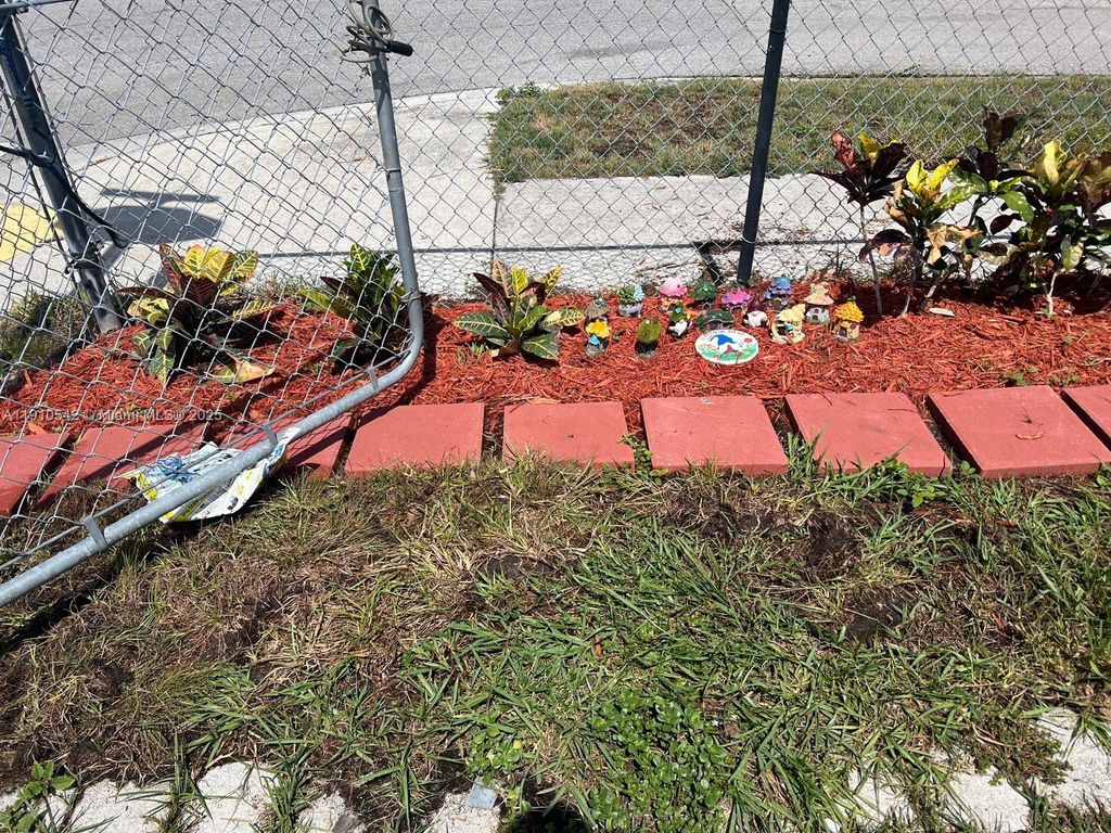 Photo of 1296 W 36th St, Riviera Beach, FL 33404 (MLS # A11910542)