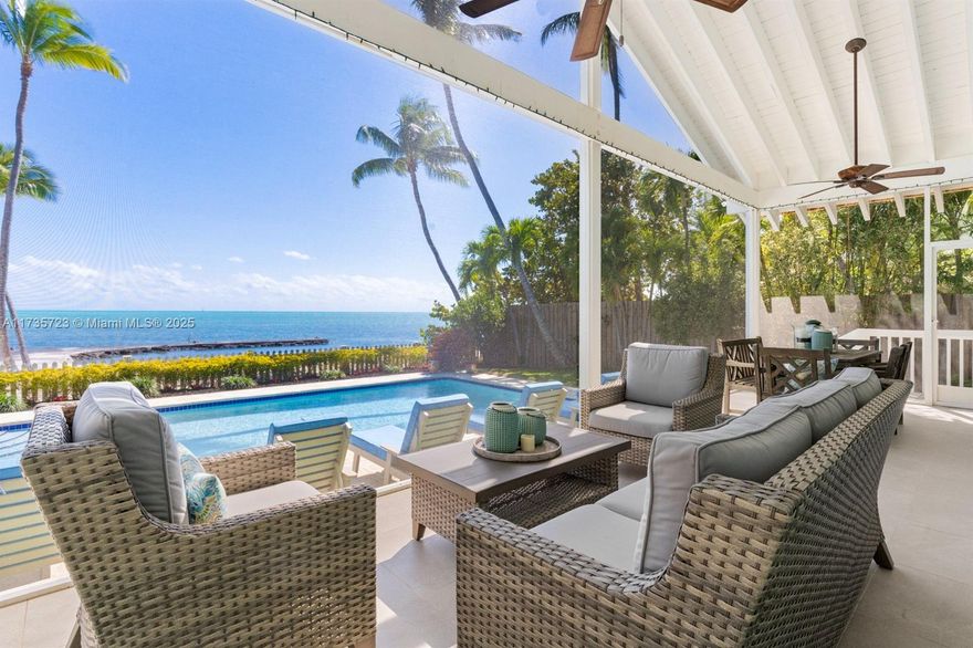 Discover Coconut Cottage, Your Tropical Paradise in Islamorada! Coconut Cottage beckons you to the quintessence tropical living in Islamorada. This oceanfront haven boasts a 90ft. Sandy Beach, a boat basin, and an inviting waterfront pool, creating an idyllic backdrop for both relaxation and adventure. The main residence, featuring 4 bedrooms and three bathrooms, exudes vintage Florida coastal comfort. The charm of the property is further enhanced by a screened-in porch, where one can savor panoramic ocean vistas and gentle sea breezes. A separate one-bedroom, one-bath guest cottage offers additional privacy and comfort, making it ideal for hosting friends and family. Constructed with durability in mind, both homes feature concrete walls and metal roofing.