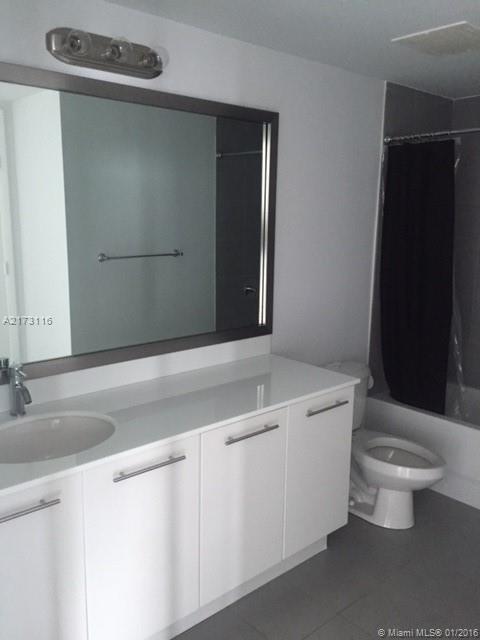 MINT CONDOMINIUM - Residential Lease