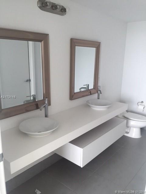 MINT CONDOMINIUM - Residential Lease