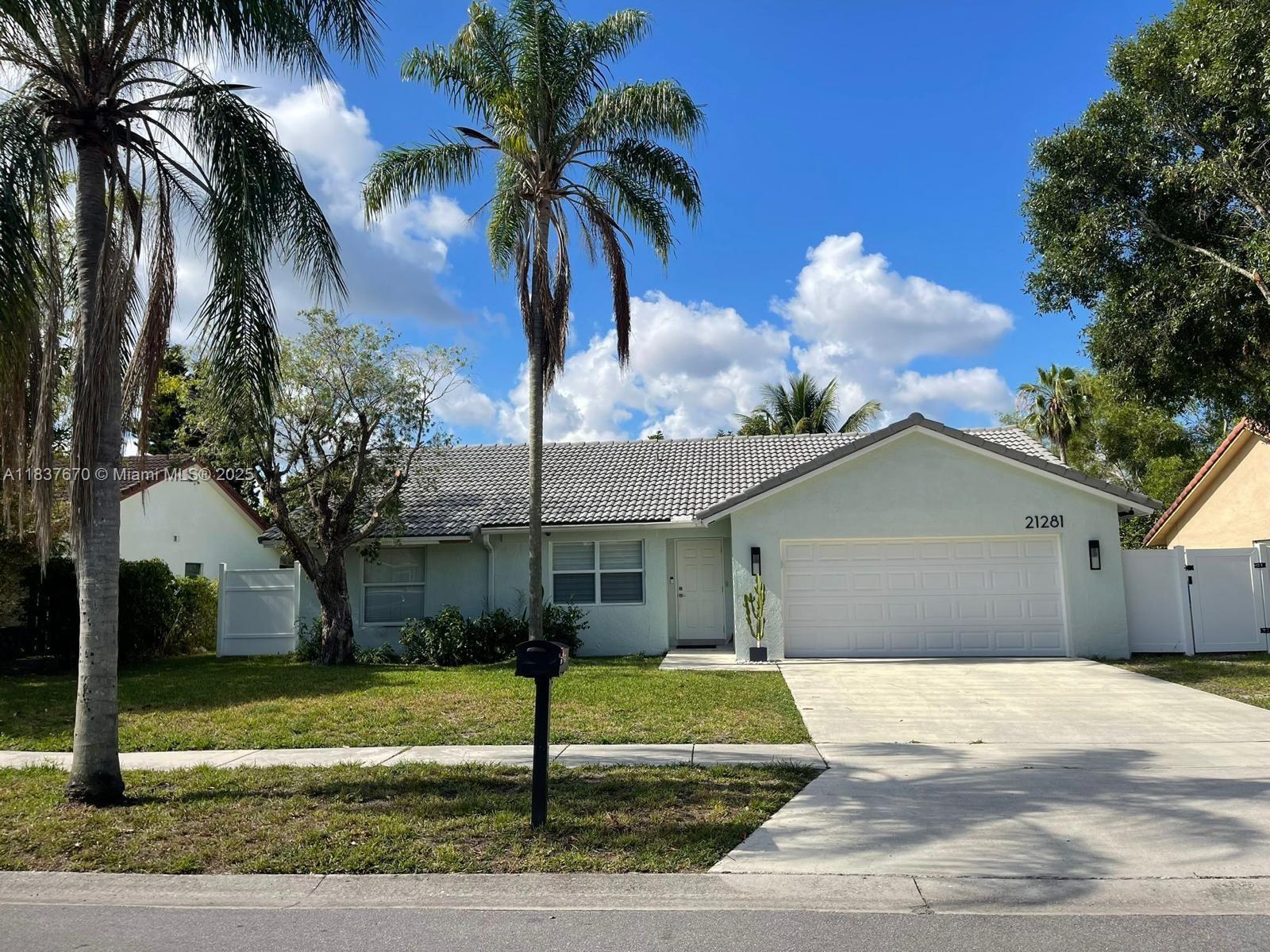 Located at the desirable Timbers of Boca, this upgraded and high end remodeled house is the place that you were looking for to call Home. Excellent "A" rated schools area ( Sandpiper Shores, Eagles Landing, Olympic Heights). 5 min to the corner of Glades and 441, one of the most complete intersection in the Unites States offering 5 supermarkets, 3 pet stores, restaurants, banks, parks, major retail stores, LA Fitness and EoS gyn.The house also features impact glass windows/doors, huge master bathroom shower, newer AC and a relaxing lake view at the completely screened pool area. Part of the garage has been converted to a bigger laundry/storage area.