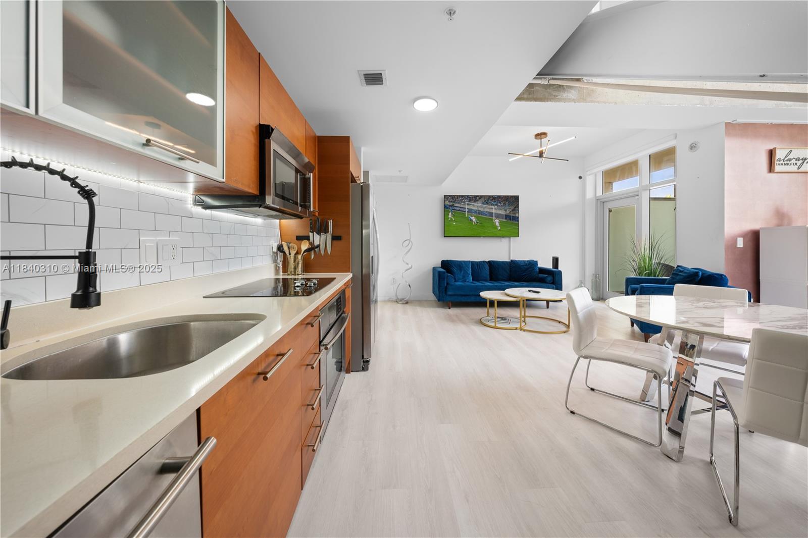 Discover this exclusive Live-Work Loft in Midtown! This spacious 2-level, 1,139 sq ft unit on the 3rd floor blends business convenience with inspired living. It features a modern kitchen with stainless steel appliances, in-unit washer/dryer, and large hurricane-impact windows. Amenities: concierge, security, garage parking with EV charger, gym, pool, BBQ area. Surrounded by retail shops and restaurants, and minutes from Wynwood, the airport, Bayside, and major expressways. Pet-friendly, fast approval, offered furnished.