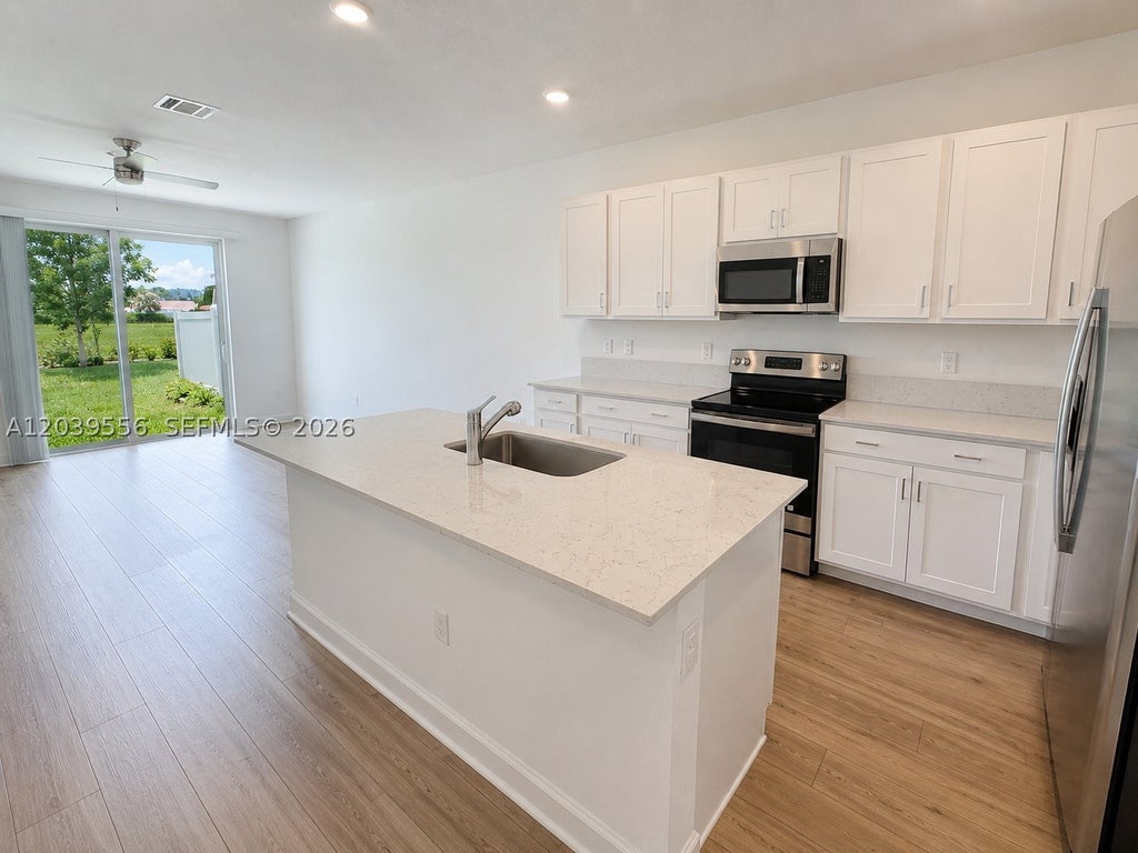 Photo of 654 SE Lake Falls St #654, Port St Lucie, FL 34984 (MLS # A12039556)