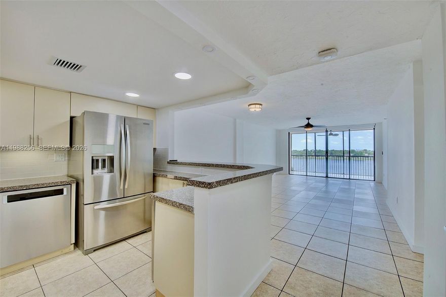One-of-a-kind, nearly 1,600 sq ft water-view condo in a quiet gated community. Fully updated with a modern kitchen, renovated bathrooms, new vinyl flooring, and high-end appliances, including a washer/dryer tower. Enjoy stunning views of Downtown Miami and Sunny Isles from the oversized balcony and master bedroom. Features include a Nest thermostat and electronic lock. Community offers a beautiful pool and walking areas. Investor-friendly—can be rented right away. Call or text listing agent for showing instructions.