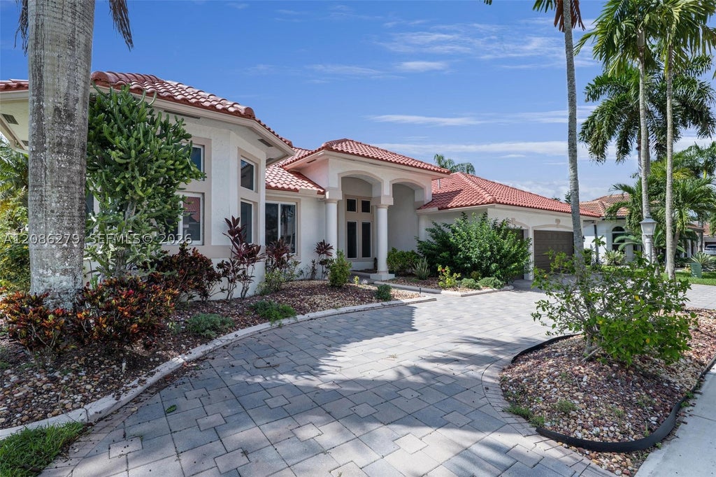 Photo of 13702 NW 18th St, Pembroke Pines, FL 33028 (MLS # A12086279)