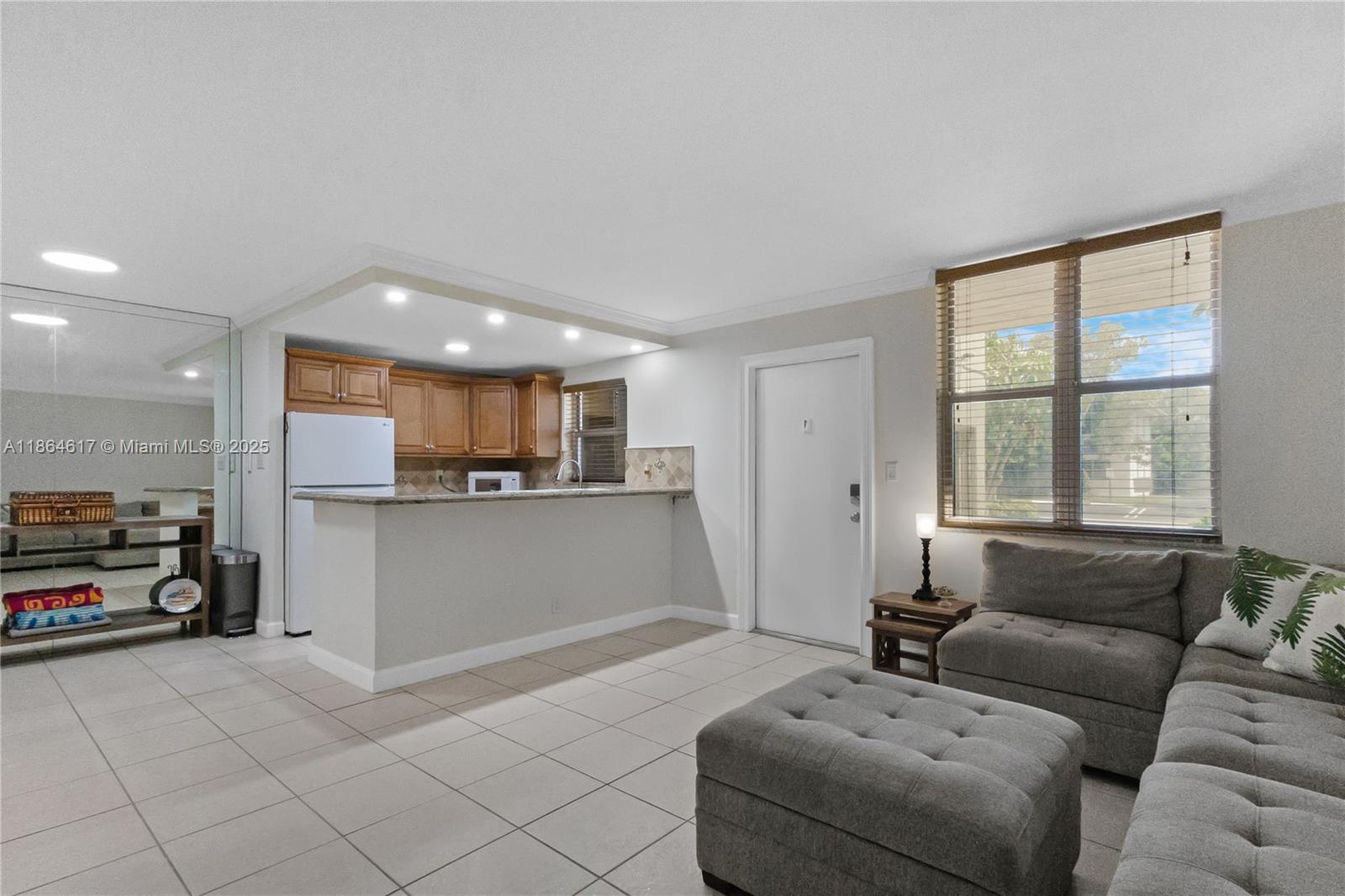 Live the Florida lifestyle in this charming updated 2 bedroom, 2 bathroom first-floor condominium located east of US1 in vibrant East Pompano Beach. Just 1.5 miles to the beach, close to LA Fitness, restaurants, and Pompano Beach Park, known for pickleball, tennis, volleyball, walking paths, a dog park and more Minutes to free beach concerts and events that make this location even more exciting. Rules say 1 parking spot for every licensed driver legally residing in the unit. Enjoy a sparkling community pool and easy first-floor access from parking. The perfect spot for fun, sun, and convenience!