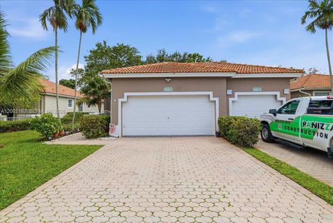 Photo of 7600 S Aragon Blvd #1, Sunrise, FL 33322 (MLS # A12002167)