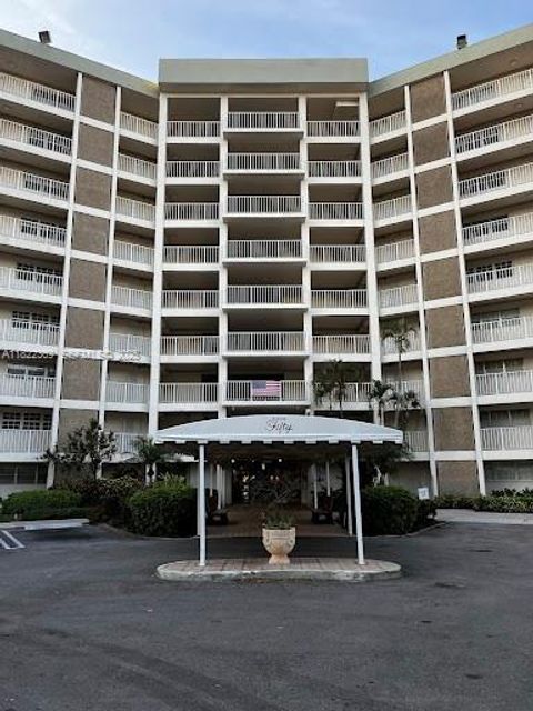 Photo of 3090 N Course Dr #807, Pompano Beach, FL 33069 (MLS # A11822369)