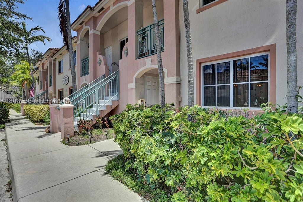 Photo of 7775 NW 22nd St #105, Pembroke Pines, FL 33024 (MLS # A12081394)