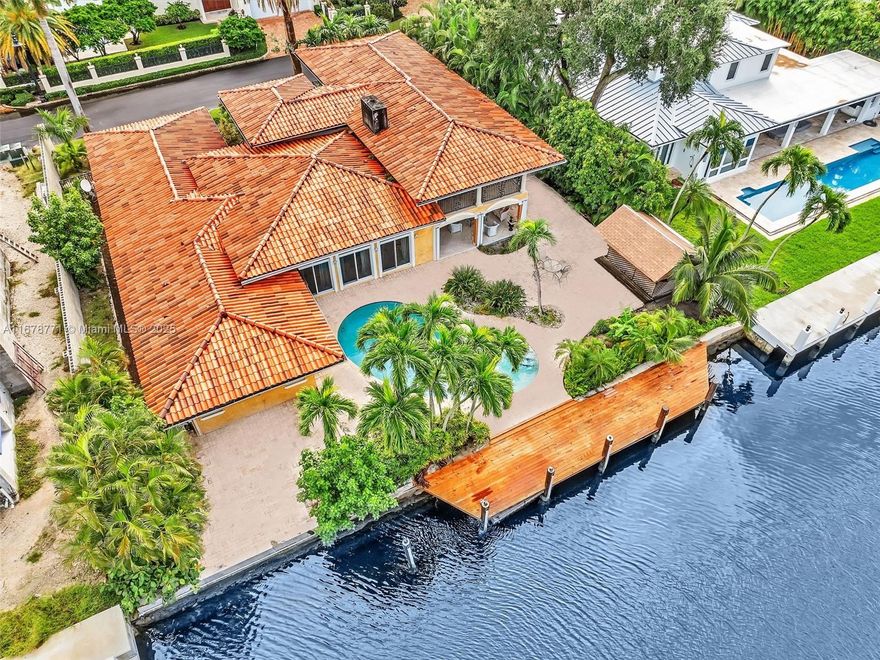 Best-Priced Home on the Street!
This spectacular Las Olas Mediterranean estate boasts 100 feet of prime deep-water frontage, perfectly accommodating up to a 90' yacht. A true boater's dream, this 5-bedroom, 4-bath residence offers quick ocean access and a spacious dock. Inside, enjoy a custom-designed chef's kitchen, soaring 12' ceilings, and a light-filled great room with expansive arched windows showcasing stunning pool and waterway views.
The luxurious primary suite features a private waterfront terrace and a spa-like his-and-hers bath. Set on an exclusive 12,999 sq. ft. lot on the Isle of Palms, just off Las Olas, this exceptional property offers direct Intracoastal access. It is just minutes from the ocean, steps from the beach, and vibrant Las Olas Boulevard.