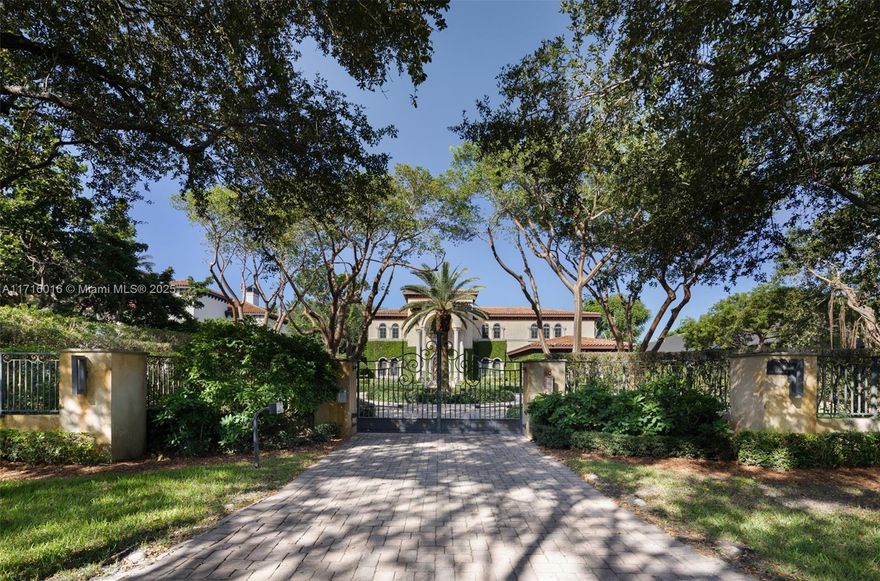 Welcome to “Lake Como in Miami,” an enchanting sanctuary on coveted W. Suburban in N. Pinecrest. 9BD/7.5BA/4-car villa seamlessly fuses traditional & modern design, featuring a dramatic entrance, soaring ceilings, and a 1920’s theater. A gourmet Wolf/SubZero kitchen, breakfast & family room, formal living, library, game room & 2,000-bottle wine cellar set the stage for luxurious living. Three additional flex bedrooms downstairs. A lavish primary wing with spa bath and huge walk-in closets; 2nd office,VIP suite, & additional bedrooms/gym upstairs.  Embrace resort-style indoor/outdoor living with a pool, spa, expansive terraces, built-in summer kitchen, gardens, putting green, gazebo, and guest house. Crestron, impact glass,  generator, & elevator complete this remarkable retreat.