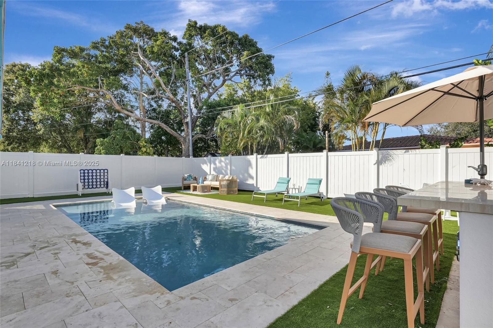 Welcome to your stylish retreat in vibrant Fort Lauderdale! This beautifully updated two-bedroom unit offers a modern and comfortable home base for your South Florida adventure. The interior boasts a spacious and contemporary living room and features a plush queen bed in the main bedroom and two versatile single beds in the second, providing ample space. The full kitchen is meticulously stocked, from cutlery to cookware, making meal prep a breeze. This unit also features a full bathroom with a luxurious walk-in shower and the added convenience of an in-unit washer and dryer. Beyond your door, a gorgeous shared pool area invites you to unwind and cool off, with BBQ & lounge area. Your stay also includes one dedicated parking space, making your Fort Lauderdale exploration incredibly easy.