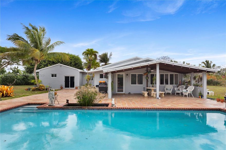 If you want to be in the perfect family environment with incredible sunset views, this is it. This home has a great floor plan, large main bedroom and bathroom. Features a pool with a terrific terrace, electric gate, stainless steel appliances, and a bar. The 4th bedroom is currently used as an office but has a closet. Includes impact windows and doors. All bathrooms have walk-in showers, and some have Jacuzzis. The property was recently painted. It has two-zone air conditioning, a well, and two septic tanks. There are also fruit trees, including avocado.