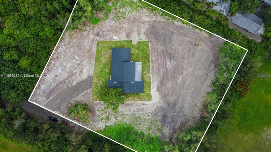 This ag land is ready for you to build your agriculture (possibly) business w/ an existing home you can live in while you tend to your potential agricultural income. This home (or office with proper permits) has been completely renovated from top to bottom & is a 3B/2B w 2.5 car garage, sitting in the middle of just under 2.5 acres. If you get AG exemption- it will keep taxes LOW! New roof. All impact. Also great for a business owner that has a lot of equipment to store at home. Private location on dead end street. Very secluded but minutes to the TP & steps away from fresh produce & raw food boutique "farm store" Glaser's Farms. Private country life, no association or neighbors close by, & no reason for many to even be on your road, but still close to the city NORTH or SOUTH =)