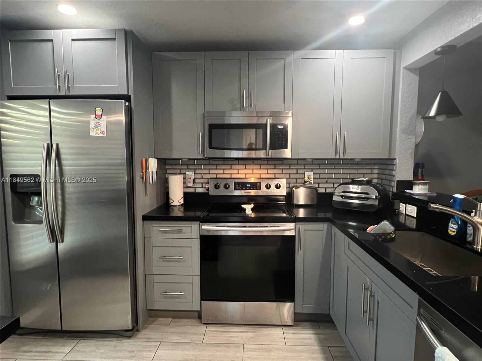 Coming soon to market. Updated unit in 55+ Bermuda Club