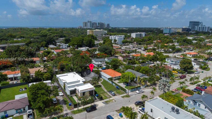 Exceptional opportunity in the desirable Silver Bluff neighborhood! Situated on an oversized 7,150 sq. ft. lot — larger than many currently available in the area — this income-producing property features three living spaces configured as one 2-bedroom/1-bath unit and two 1-bedroom/1-bath units, with two units tastefully updated and approximately $5,800 in monthly income. Located on a quiet street experiencing significant redevelopment with beautiful newer homes nearby, the property is just minutes from Brickell, Coral Gables, Coconut Grove, Key Biscayne, and Biscayne Bay. A rare opportunity offering excellent income potential, prime location, and future upside in one of Miami’s fastest-growing neighborhoods.