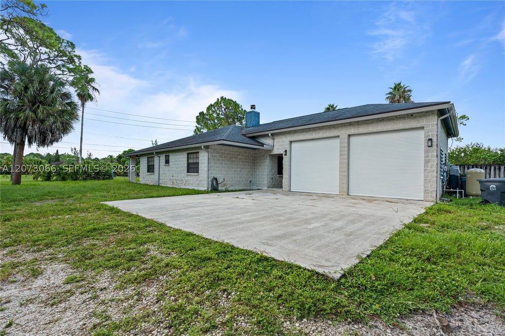 Photo of 7261 140th Ave N, West Palm Beach, FL 33412 (MLS # A12073066)