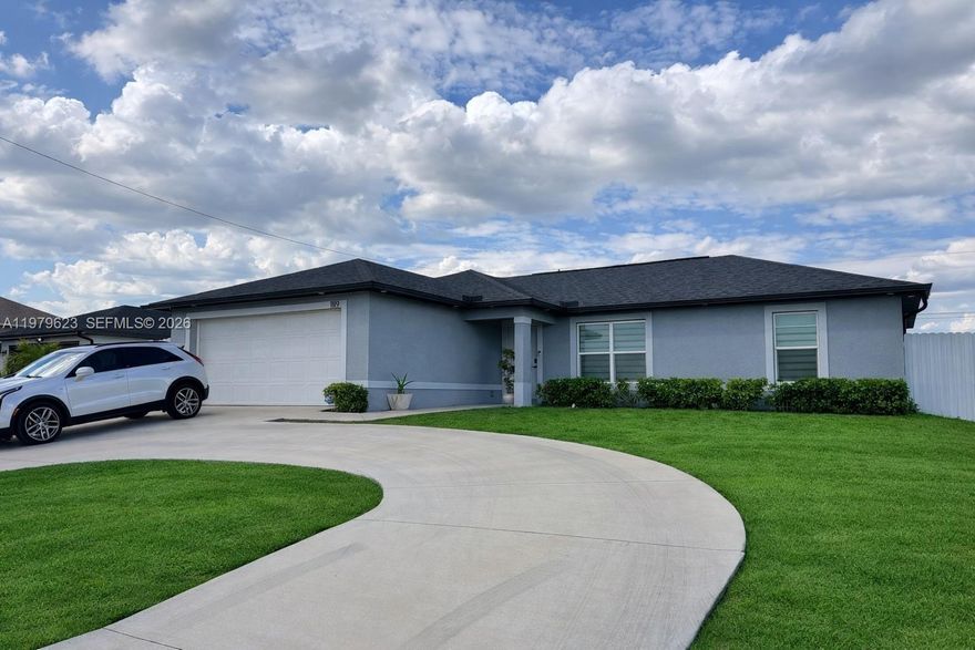 Welcome to this amazing house in the sunny city of Cape Coral, this 3 bedroom 2 bath with in-law quarters is an example of modern luxury, style, comfort and living space in a serene neighborhood, This property offer open-concept design, gourmet kitchen meticulous attention to detail and abundance natural light that fills every room, with a huge fenced lot and outside kitchen perfect for entertainment. Schedule your private showing today and fall in love with this home for yourself!!!