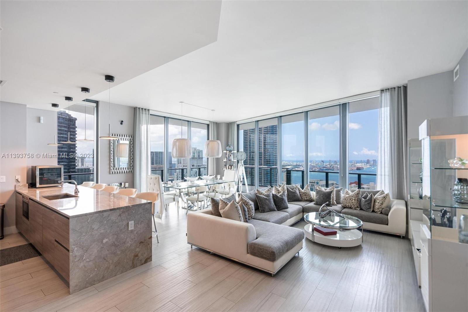 Unique Penthouse on SLS Brickell featuring panoramic views extending across Biscayne Bay, Miami Beach and Miami Skyline. 3 bedrooms all en-suite plus den. High end finishes include imported Italian porcelain floors, Bosch and Sub-zero appliances, Light marble kitchen countertops, floor to ceiling windows. Wrap around balcony with picturesque views from sunrise to sunset. Amenities include spa, state of the art gym, heated pools, access to SLS Hotel services, restaurant and more.