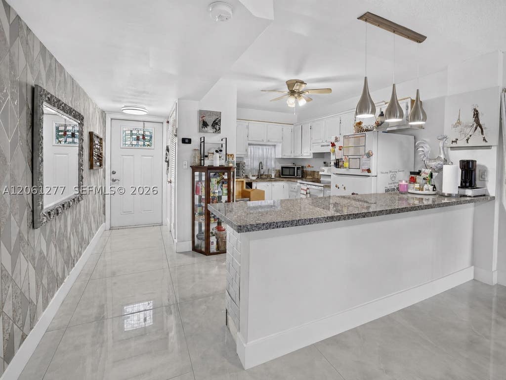 Photo of 8941 S Hollybrook Blvd #202, Pembroke Pines, FL 33025 (MLS # A12061277)