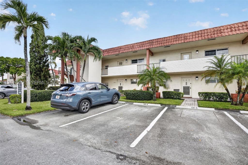 Photo of 8941 S Hollybrook Blvd #202, Pembroke Pines, FL 33025 (MLS # A12061277)