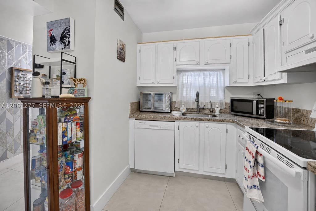 Photo of 8941 S Hollybrook Blvd #202, Pembroke Pines, FL 33025 (MLS # A12061277)
