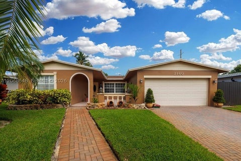 Photo of 2160 NW 91st Ter, Pembroke Pines, FL 33024 (MLS # A12068548)