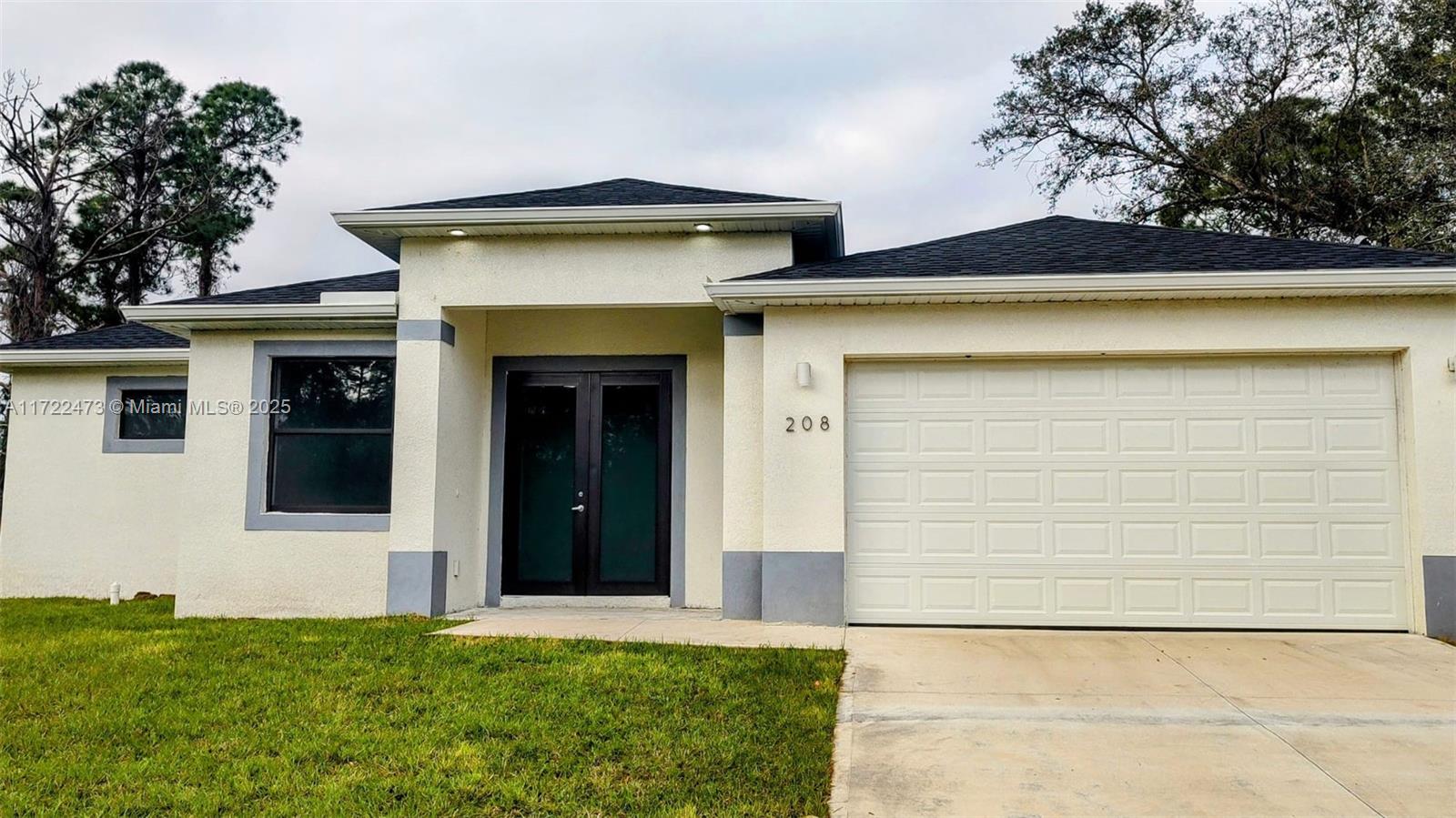 Property for Sale at 208 Genoa Ave S Ave, Lehigh Acres, Lee County, Florida - Bedrooms: 3 
Bathrooms: 3  - $345,000
