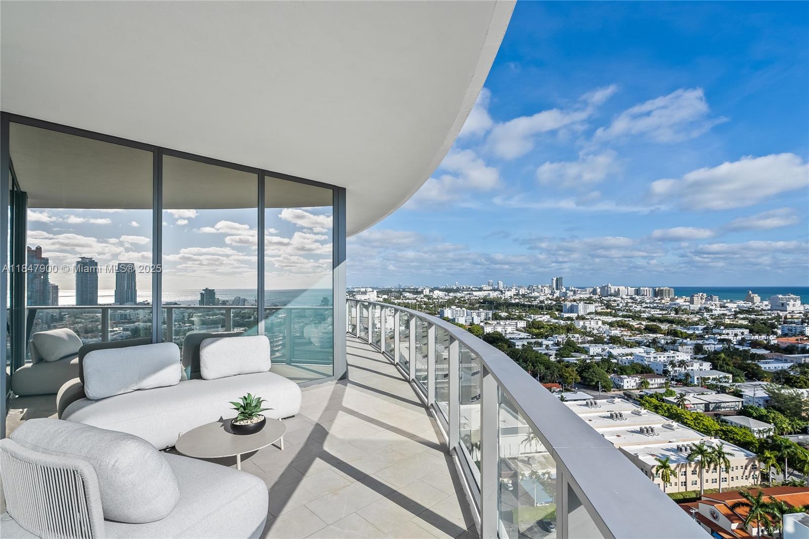 Expansive 4-bed, 5-bath residence offers 3,521 sq ft of interior space and sweeping South /East /West exposures for all-day sunlight and panoramic views of the Ocean, city skyline, and Bay. Floor-to-ceiling windows open onto 1,183 sq ft of wraparound terrace perfect for outdoor entertaining or quiet reflection above South Beach.
The open-concept living spaces flow seamlessly into a kitchen equipped with Gaggenau appliances, white oak cabinetry and quartzite countertops. The primary suite is a serene retreat with its own sitting area, walk-in closets, and marble bath.
Five Park is the newest addition to the Miami Beach luxury condo offering. Its residents enjoy access to world-class services and amenities, including two pools, a state of the art gym and spa, and a private beach club.