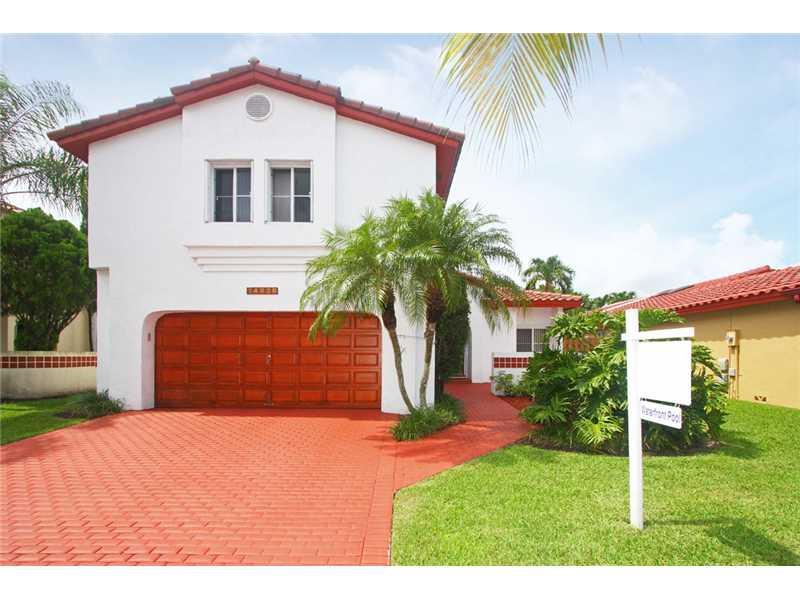 Rarely available, prime lakefront location! Spacious 4 bed 2.5 bath home in Chantarelle (Sunfish at the Hammocks). Home features an open kitchen & family room overlooking the sparkling pool & gorgeous lake views. Master bdrm downstairs, 3 bdrms upstairs , formal living & dining room and a large covered patio which is perfect for entertaining. Low HOA $220 per quarter. Enjoy all the Hammocks amenities: tennis, clubhouse, pools, exercise room, lake & jogging trails. Just a few steps to the beach.