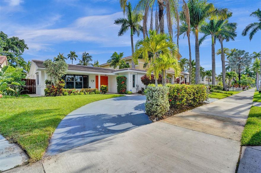 Updated 4-bedroom 4-bathroom home 5 blocks to Hollywood Beach in sought-after Hollywood Lakes. The 1983 SF home features: tile and laminate floors throughout, spacious open kitchen w/stainless steel appliances, large living and dining room plus Florida room, utility/laundry room, impact windows, and roof 2022 . Great private fenced backyard with pool. Tesla charging station. This amazing location offers the best of South Florida living: available rides with the Circuit Shuttle to the beach or anywhere Downtown. Enjoy the 2.5-mile Hollywood Beach Boardwalk, ArtsPark at Young Circle, and Downtown Hollywood with countless choices for dining/shopping. Just a short drive to Aventura Mall, Brightline Train, Gulfstream Racetrack & Shops, Dania Pointe, and Ft Lauderdale Airport. No HOA.