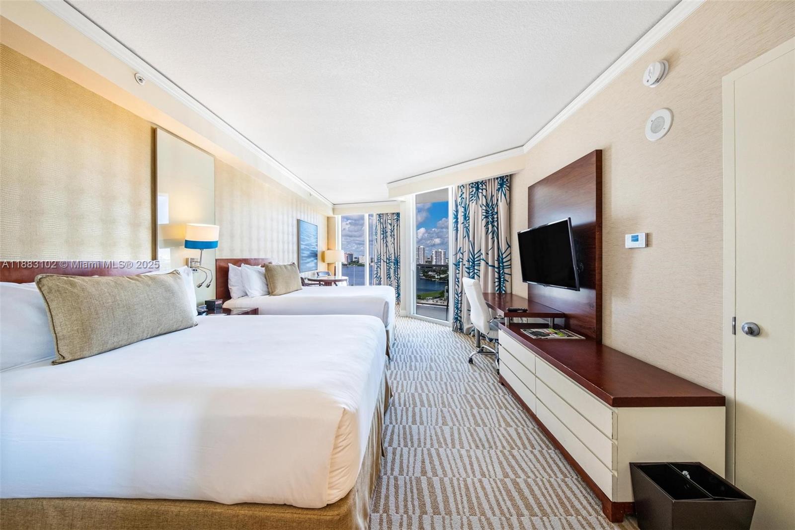 Discover the perfect investment opportunity at the prestigious Trump International Resort in Sunny Isles Beach. This oceanfront studio is currently enrolled in the hotel rental program, providing seamless management and steady rental income.
The unit features modern finishes, spacious bathroom, and is fully furnished, ready for guests. Owners and guests enjoy world-class amenities including direct beach access, multiple pools, fitness center, spa, restaurant, bar, business center, tennis court and 24-hour concierge service.
Located in the heart of Sunny Isles, minutes from Bal Harbour Shops and Aventura Mall, this property combines luxury living with strong investment potential. Perfect for investors and those seeking a vacation getaway with income-generating benefits.