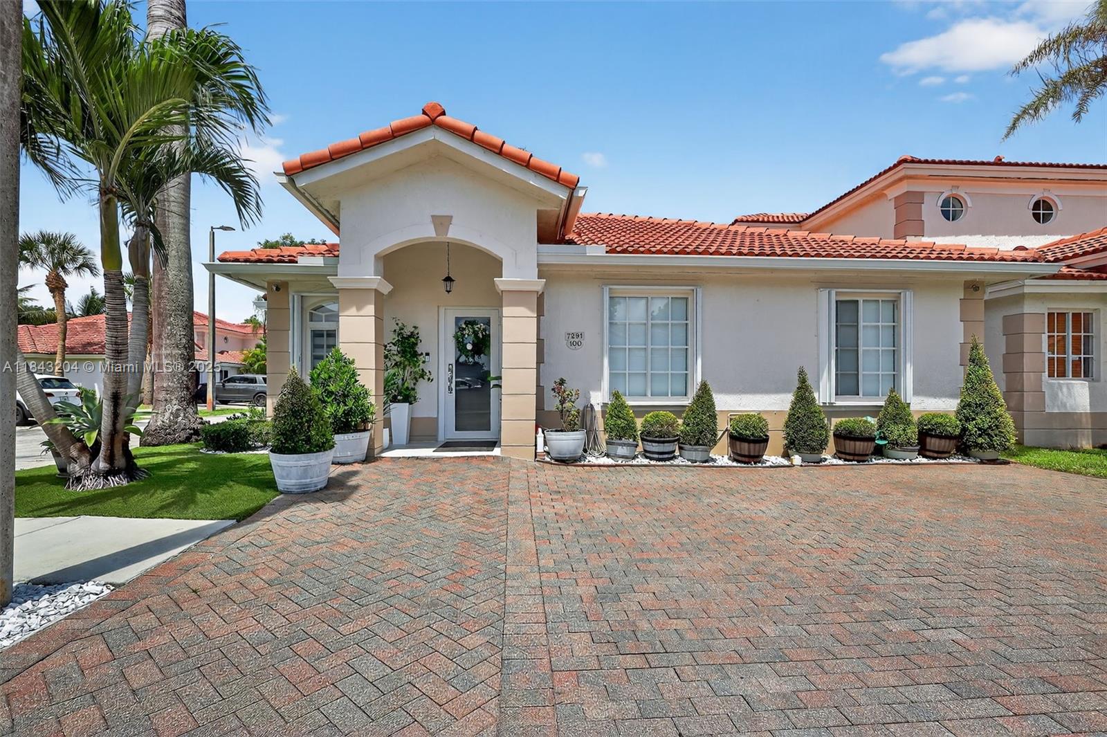 Beautiful 3-bed, 2-bath corner villa with extra A/C room ideal for office or 4th bedroom. Features enclosed terrace with thick glass and back door, accordion shutters on all windows, new gutters, and a newer A/C (only 3 years old). Spacious layout with ceramic tile throughout. Two assigned parking spaces. HOA is $319/month and includes exterior insurance, water, trash, and landscaping. Located in Bella Colina near 826, I-95, and I-75. Pet-friendly community with pool, BBQ area, and quick approval. Perfect for end-users or investors—OK to lease right away!