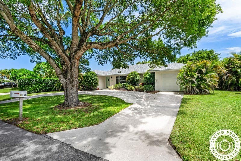 Photo of 4366 Althea Way, Palm Beach Gardens, FL 33410 (MLS # A12041031)