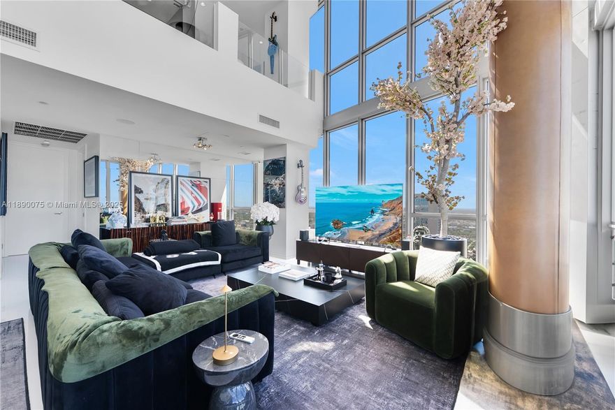 Soaring 63 floors above Downtown Miami in the Marquis, this 2-story penthouse offers 270° views of Biscayne Bay, the ocean, and city skyline. Featuring 2 bedrooms, 2.5 baths, and over 3,000 sq ft of open living space with 20-ft ceilings and floor-to-ceiling windows. Private elevators open to a chef’s kitchen with stainless-steel appliances, media room, private terrace, and Sonos surround sound. Residents enjoy 24-hr concierge, spa, fitness center, 2 pools, restaurant, and exclusive Beach Club access at Bentley Hilton South Beach. Steps from Bayfront Park, Kaseya Center, Miami Worldcenter, and South Beach.