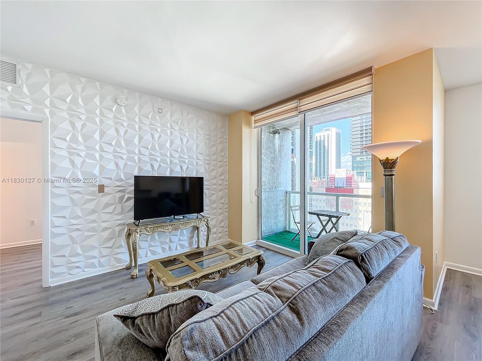 Discover urban living at its finest in this stunning 1-bed with a versatile den and 2 full baths. Fully furnished and thoughtfully designed, this residence offers a blend of comfort and style. The modern kitchen boasts high-end appliances, while the open living area is perfect for entertaining or relaxing. The den can be used as a home office or guest room, providing additional flexibility. Enjoy city and bay views from your private balcony and take advantage of the building's amenities, including 4 pools, fitness center, SPA and 24-hour concierge. Situated in the heart of Miami, you'll be steps away from dining, shopping, and entertainment options. Make this your new home and experience the vibrant Miami lifestyle.
