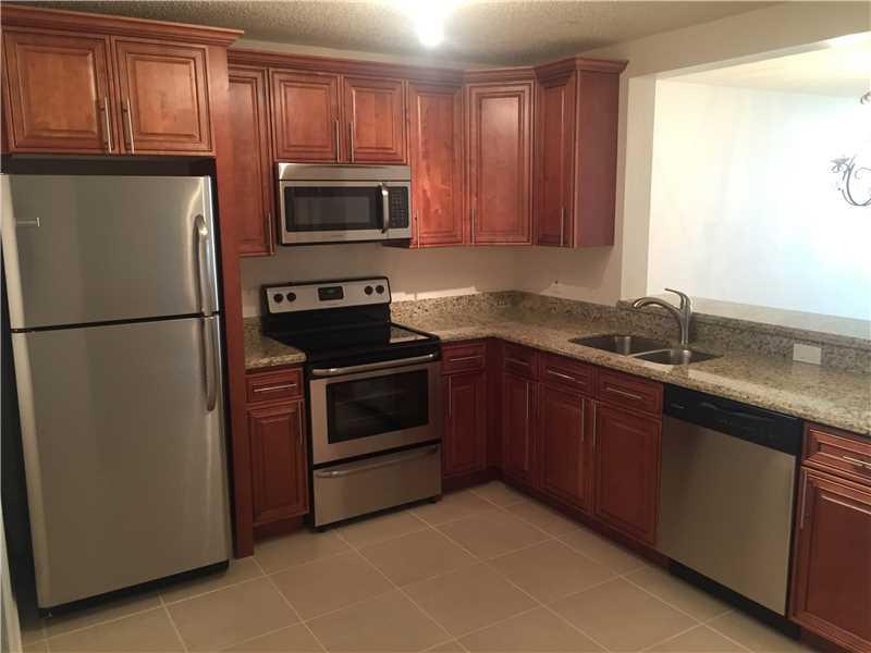 Completely remodeled 2/2 villa in heart of Boca Raton. Live an active lifestyle without membership fee. New tiles, freshly painted, all new SS appliances w/ granite & wood cabinetry. New bath vanities, toilets. New garage door operator, new windows, new b linds, new light fixtures. Washer/dryer inside. Very open bright and neutral colors, new hardware, nothing to do but enjoy. Sit outside on screened patio and enjoy nature. Beautiful active clubhouse and pool. You must see this one. Excellent workmanship.