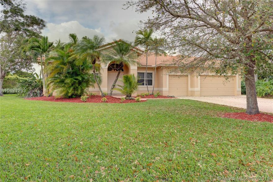 Extraordinary opportunity to own this Gorgeous 3/2 Estate Home nestled on a Builders Acre with breathtaking panoramic lake views. Bright and Spacious Floor-Plan with Formal Dining, Formal Living, Spacious Family Room, Breakfast Nook, Upgraded Kitchen with Wood Cabinets,Granite Tops and Enormous Walk-In Pantry.This home has a 3 car garage that allows you to easily convert the 1car garage into a 4th bedroom as per floor plan.The backyard was designed for the family that loves to entertain and features Tropical Palm Trees, massive grass area, Resort-Style Pool with almost 3000s/f of paved Lenai, massive Tiki Hut and huge granite bar perfect for enjoying cocktails with guests while watching the sunset over the lake.All windows and doors are fully protected by panel shutters. A Must see!!