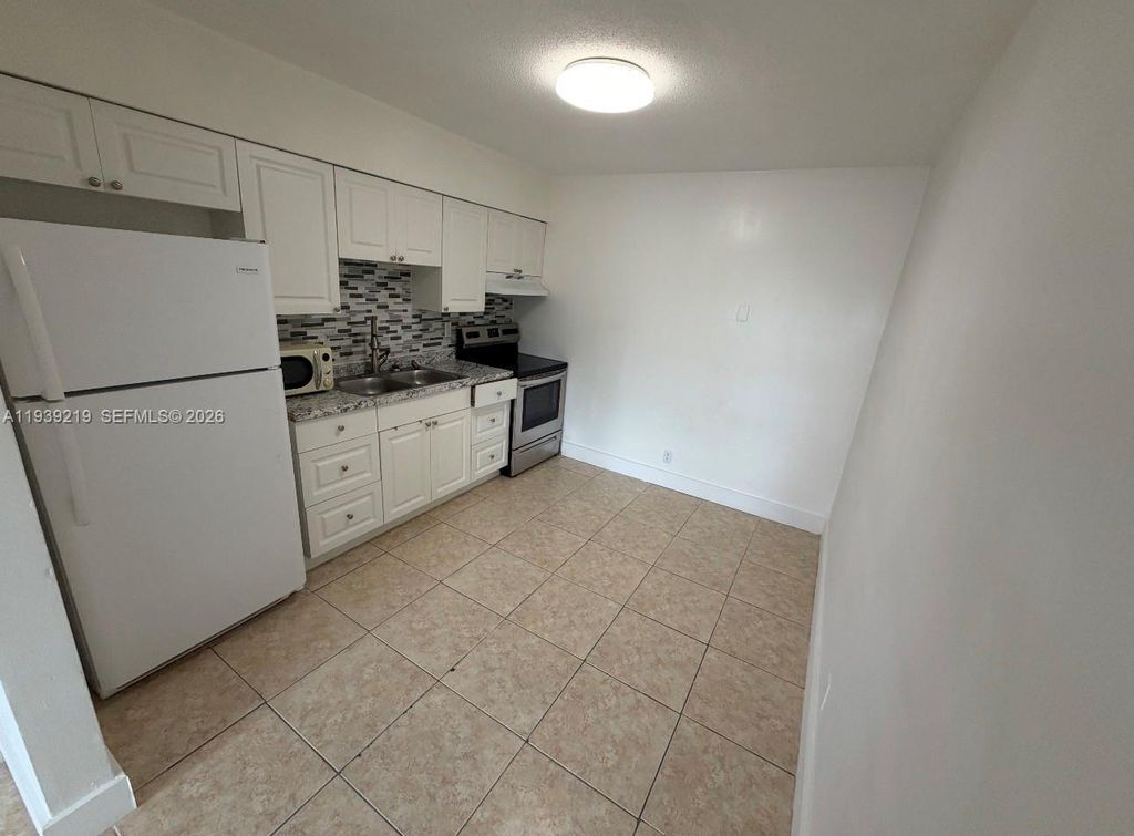 Photo of 3970 NW 31st Ter #2, Lauderdale Lakes, FL 33309 (MLS # A11939219)