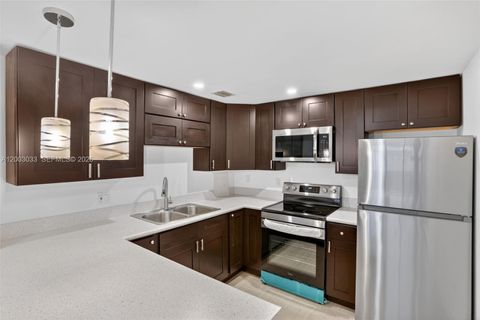 Photo of 10400 SW 108th Ave #A215, Miami, FL 33176 (MLS # A12003033)