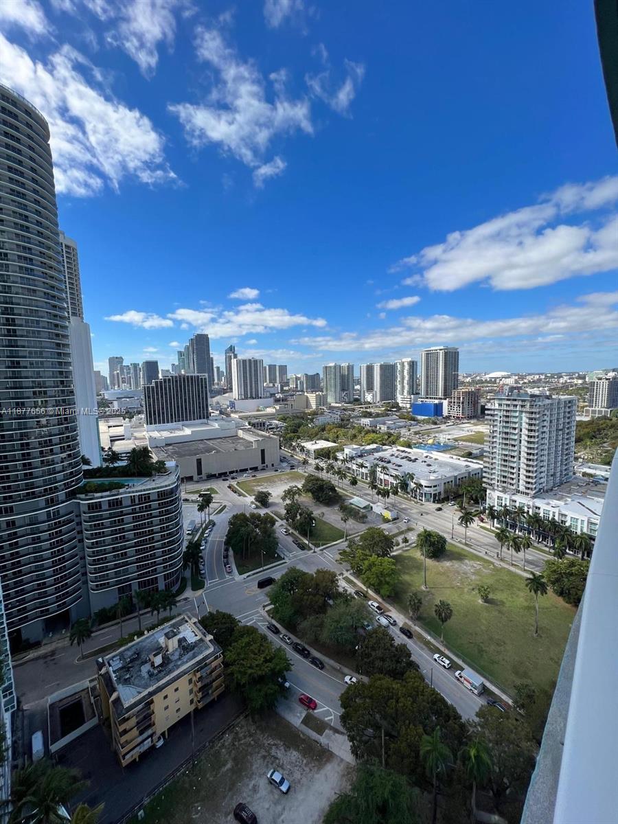 Absolutely stunning, spacious 1-bedroom, 1.5-bath high-rise condo at Quantum on the Bay! Featuring stainless steel kitchen appliances, stone countertops, and rich dark wood flooring throughout, this unit also includes an in-unit washer and dryer, completely turn-key and ready to move in. Enjoy breathtaking city and Biscayne Bay views from the private balcony, with Margaret Pace Park directly across the street. Perfectly located near Publix, highways, restaurants, cafes, and boutiques, in one of Miami’s most vibrant neighborhoods—experience the ultimate in urban waterfront living!