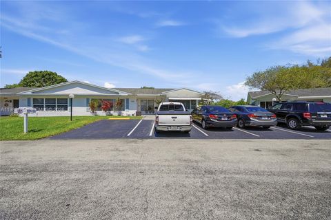 Photo of 8431 NW 12th St #D68, Plantation, FL 33322 (MLS # A11989785)