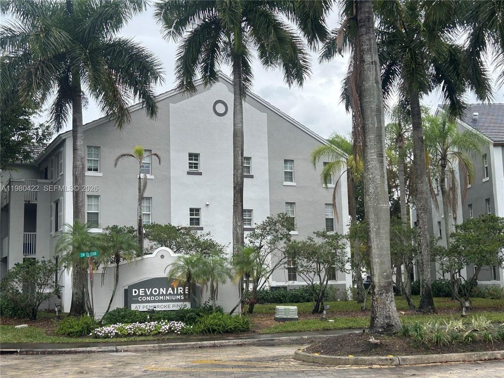 Photo of 11177 SW 8th St #204, Pembroke Pines, FL 33025 (MLS # A11980422)