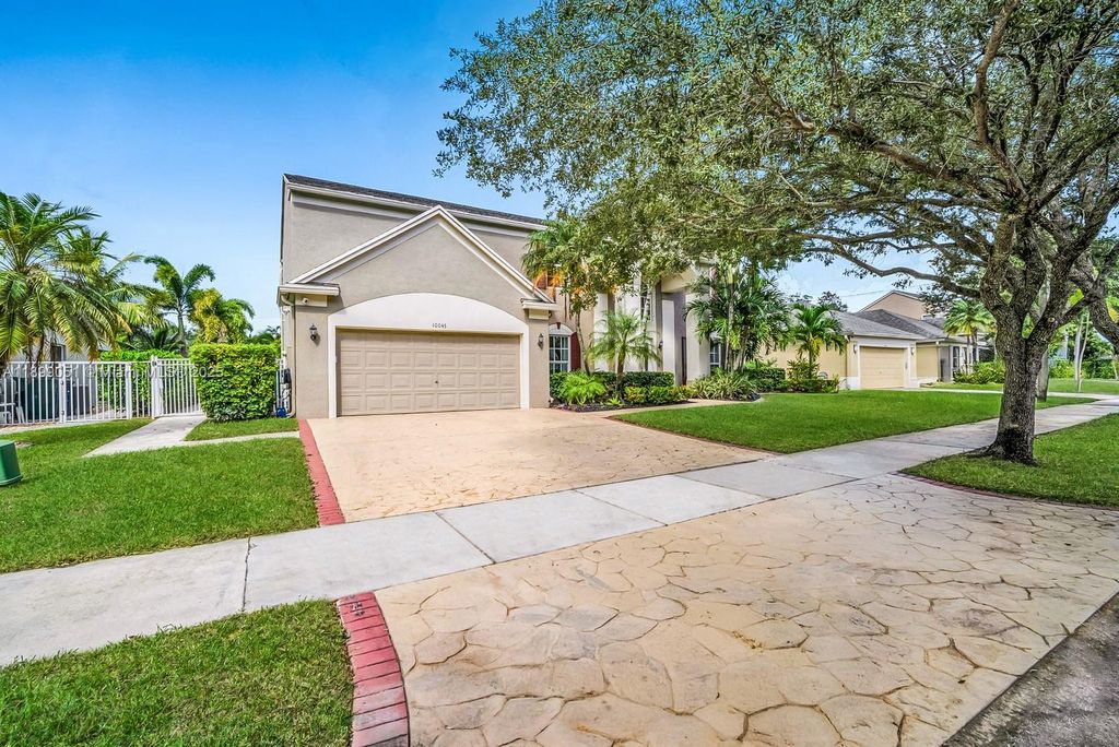 Photo of 10045 Grove Ln, Cooper City, FL 33328 (MLS # A11899051)