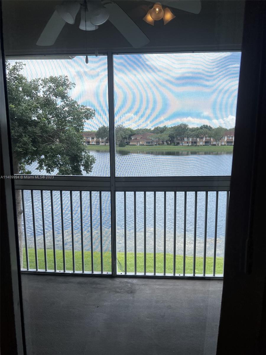 Great two-bedroom and two baths corner unit with lake view from living room and master bedroom, dryer and brand new washer inside the unit. New floors and ready to move in.