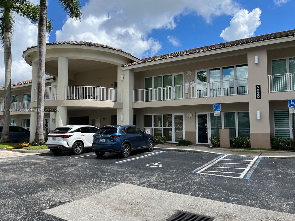 Photo of 5220 S University Dr #106C, Davie, FL 33328 (MLS # A11895619)