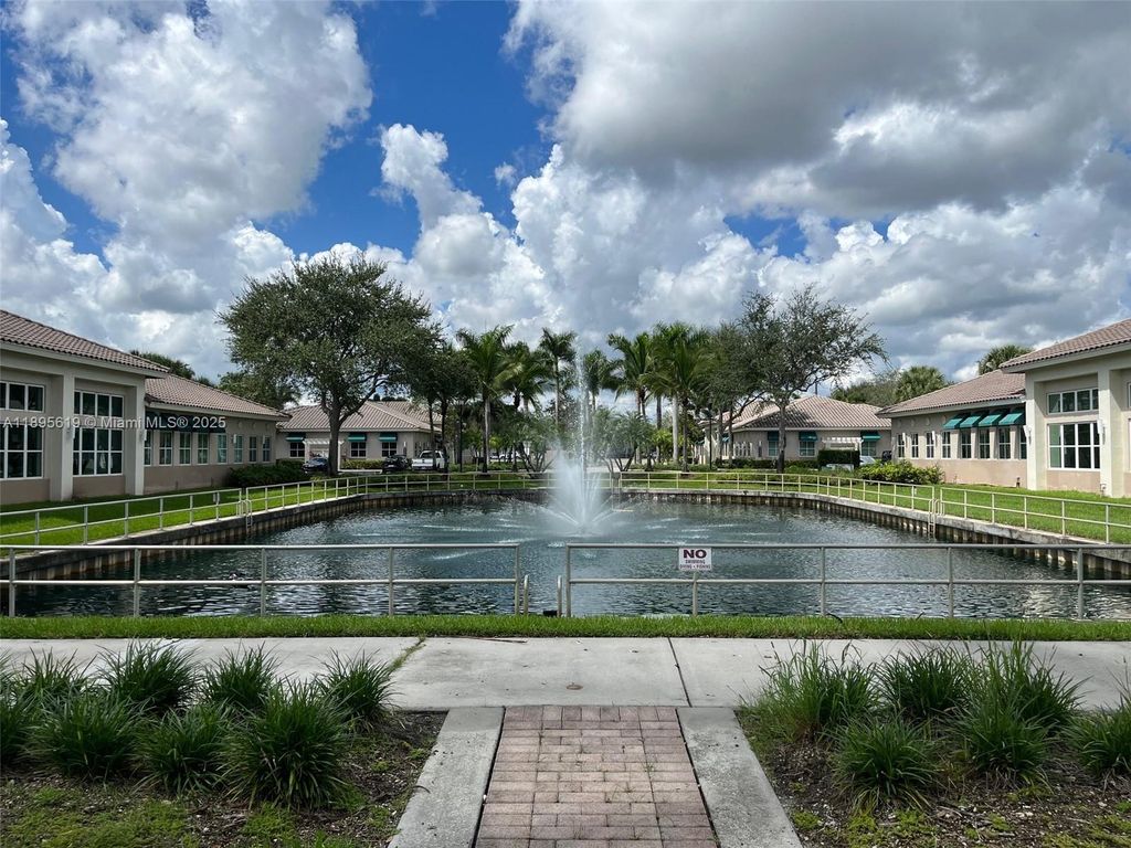Photo of 5220 S University Dr #106C, Davie, FL 33328 (MLS # A11895619)